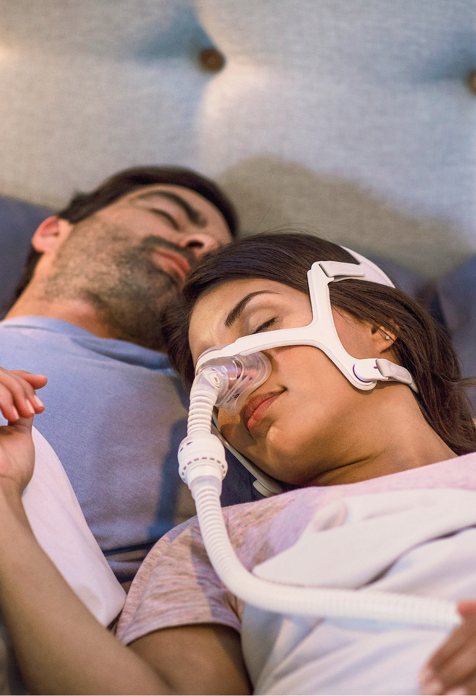 Person sleeping with a CPAP mask