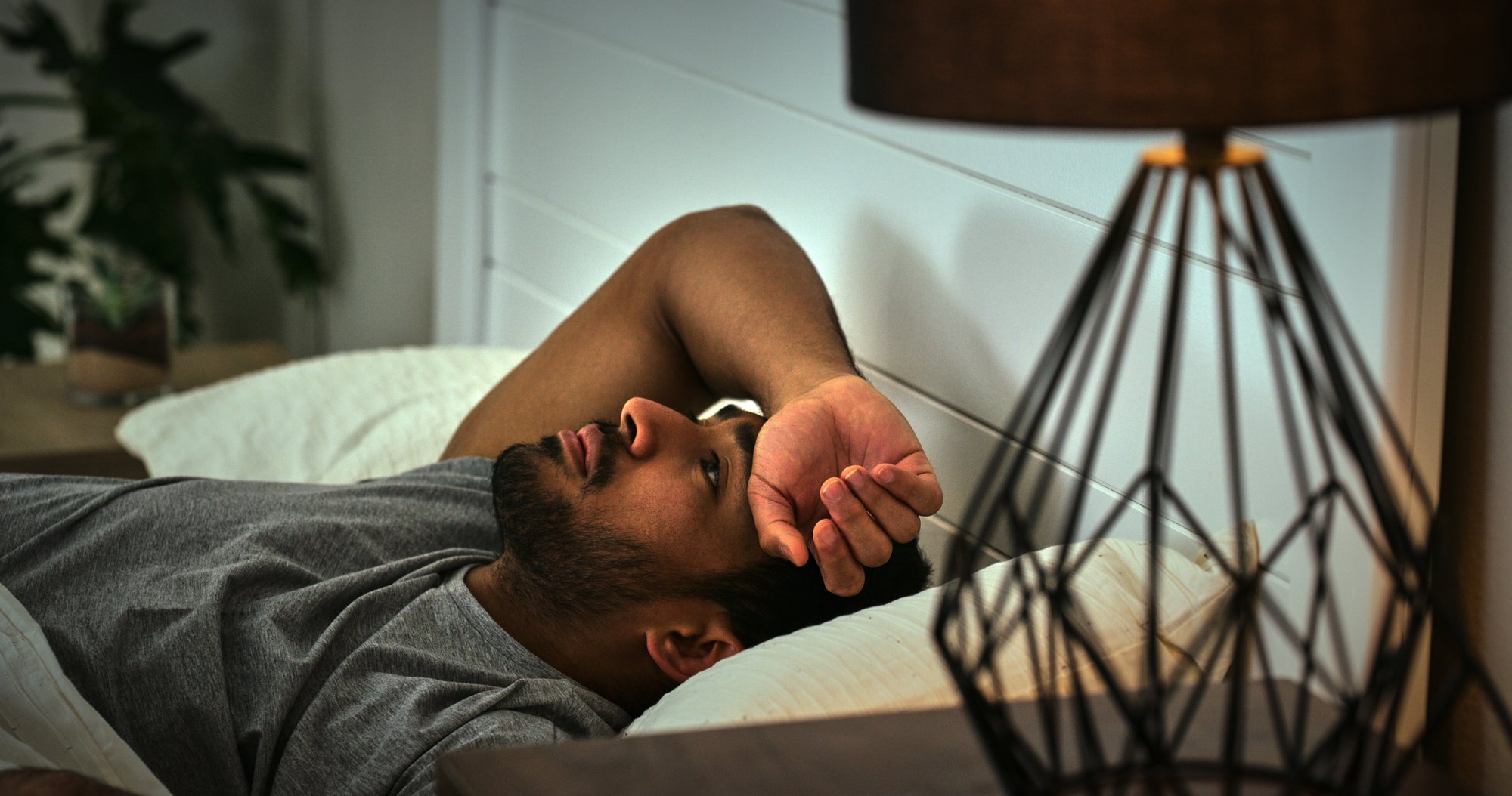  Person lying awake in bed