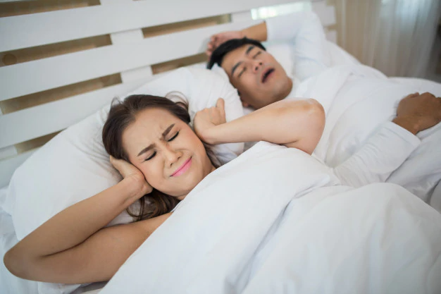 How to Help Your Partner Stop Snoring At Night?
